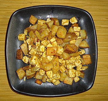 roasted potatoes and tofu on a plate